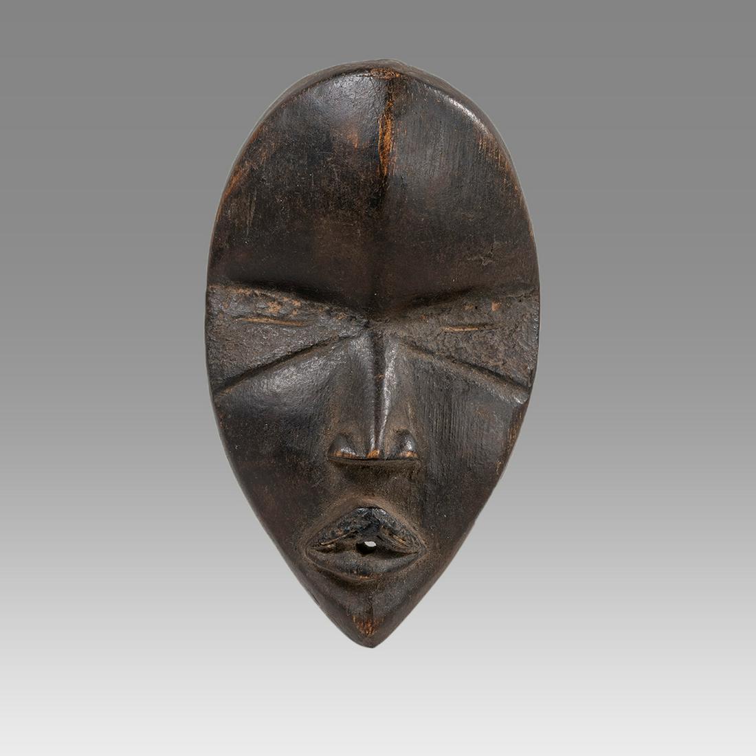 West Africa, Small Wood mask Dan Guere c.20th century. (1 of 3)