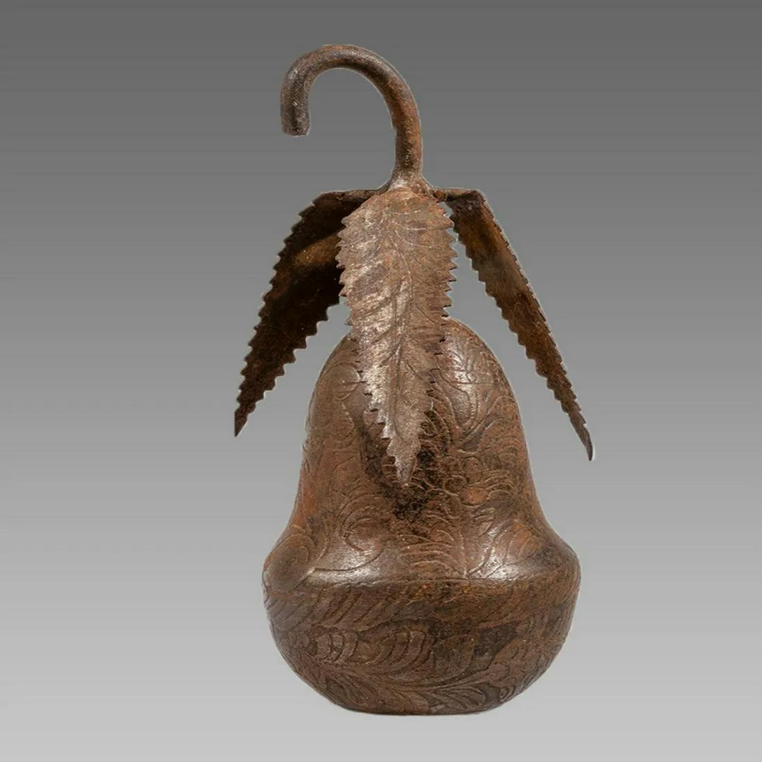 Persian Qajar Steel Fruit Ornament.: Persian Qajar Steel Fruit Ornament. Size 7 inches high. decorated with engraved floral design.