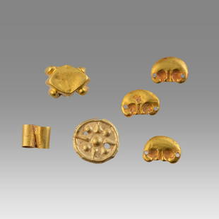 Lot of 6 Ancient Roman Gold Ornaments c.1st-4th century AD.: Lot of 6 Ancient Roman Gold Ornaments c.1st-4th century AD. Size 13-6 mm. weight 1.2 grams. High karat gold ornaments mixed types and design. Provenance: Private NYC Collection acquired in the USA Mar