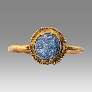 Ancient Roman Gold Ring c.2nd-4th century AD.: Ancient Roman Gold Ring c.2nd-4th century AD. Size 9.5 Ring size USA, 24 mm wide. weight 2.4 grams. Single wire solid gold finger ring with blue glass. wearable. Provenance: Private NYC Collection