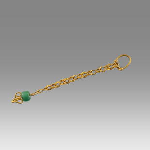 Ancient Roman Gold Nose Ring c.2nd-4th century AD.: Ancient Roman Gold Nose Ring c.2nd-4th century AD. Size 2 1/4 inches length, weight 1.3 grams. Fine gold nose ring with green glass bead. Provenance: Private NYC Collection acquired in the USA Market.