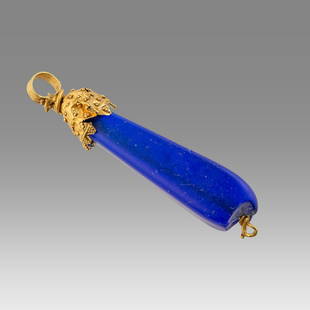 Ancient Roman Gold Pendant with Blue Glass c.2nd-4th century AD.: Ancient Roman Gold Pendant with Blue Glass c.2nd-4th century AD. Size 1 1/2 inches length. weight 2.3 grams. High karat gold pendant with blue glass bead, suspension loop. wearable. Provenance: