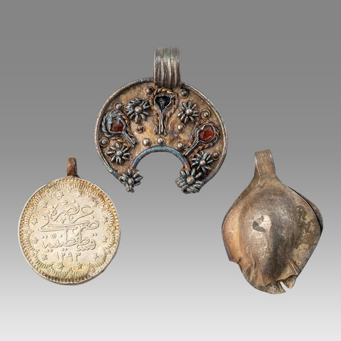 Lot of 4 Islamic Silver Ring, Pendants c.19th century AD. (1 of 2)