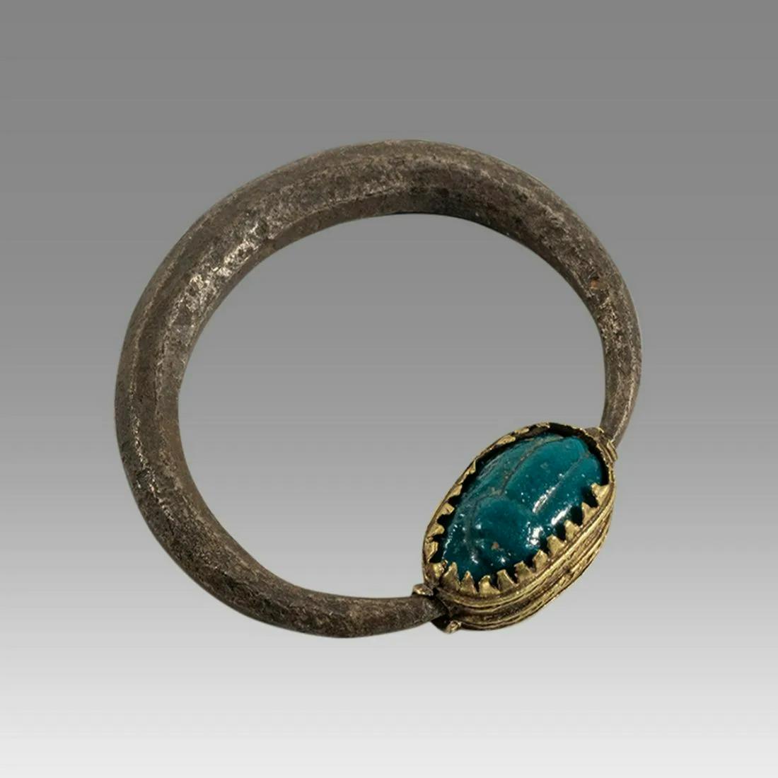 Egyptian Silver and gold ring with Glass Scarab. (1 of 2)