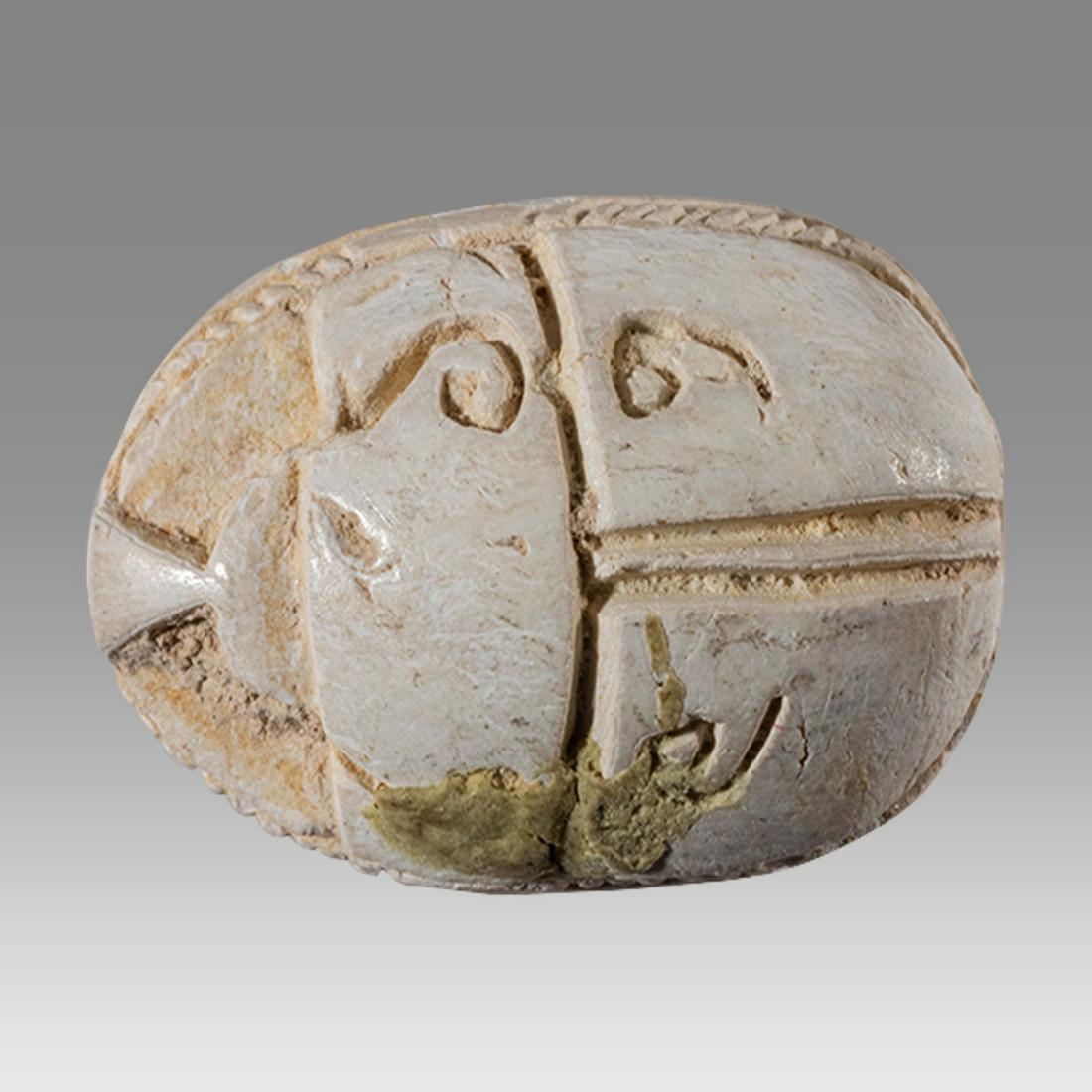 Ancient Egyptian Steatite stone Scarab c.1500-1100 BCE.: Ancient Egyptian Steatite stone Scarab c.1500-1100 BCE. Size 15 x 11 mm. Steatite scarab New Kingdom with stealized beatle back. Provenance: Ex Secret Eyes Gallery New York 1970's-1980's.
