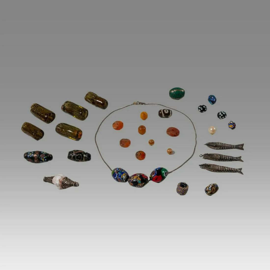 Lot of 28 Tibet Trade Beads and 3 Silver Fish Amulets. (1 of 1)