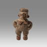 Chupicuaro Figural Rattle Wearing Feathered Costume Ca. 400-100 B.C. Chupicuaro, Mexico.