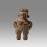 Chupicuaro Figural Rattle Wearing Feathered Costume Ca. 400-100 B.C.  Chupicuaro, Mexico.