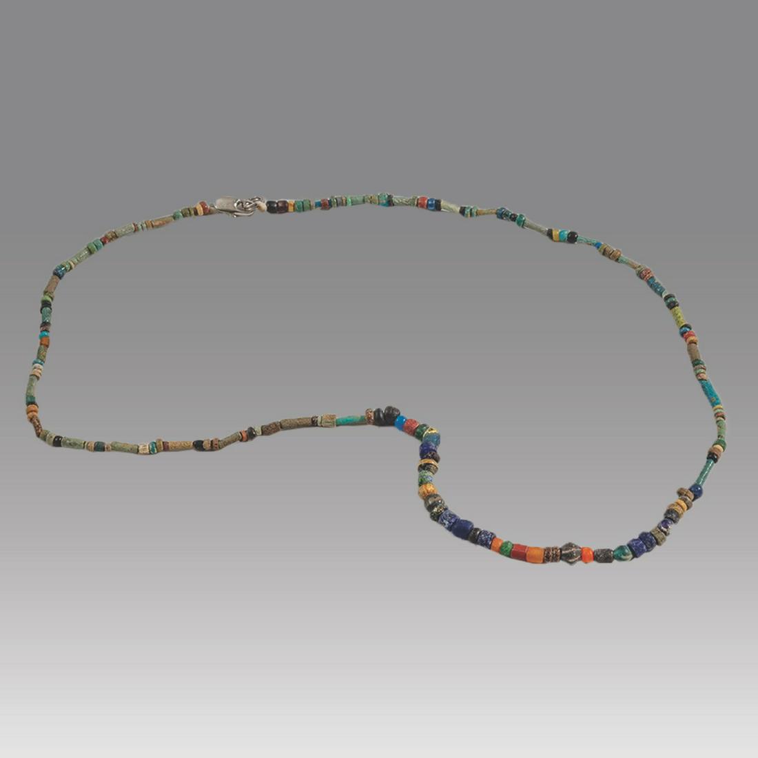 Ancient Egyptian Faience Bead Necklace c.300-50 BC.: Ancient Egyptian Faience Bead Necklace c.300-50 BC. Size 18 3/4 inches length. Great Looking single strand Faience Bead necklace, late period 300-50 BC. wearable. Provenance: Ex Secret Eyes Gallery Ne