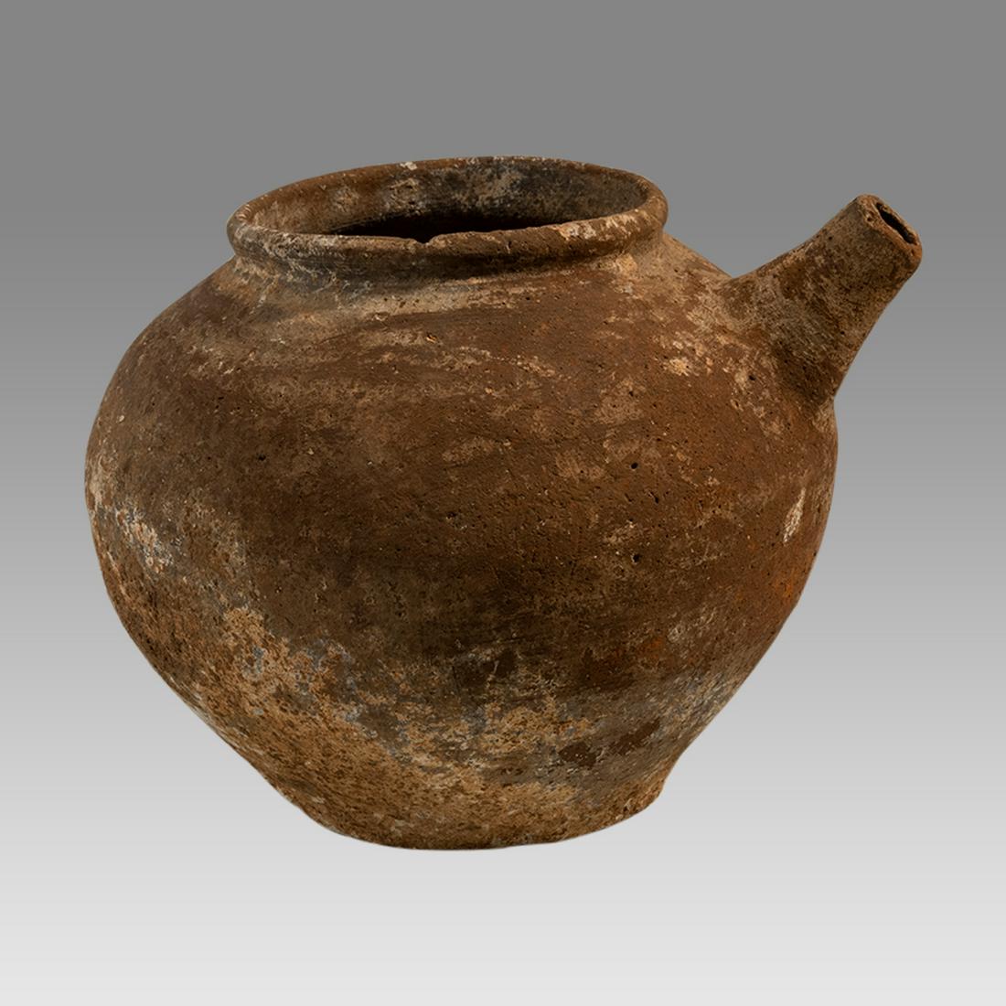 Ancient Holy Land Roman Terracotta Vessel c.2nd century AD.: Ancient Holy Land Roman Terracotta Vessel c.2nd century AD. Size 4 3/4 inches high, 6 inches diameter widest point. A large terracotta oil vessel with spout. Ex Ex Private NYC Collection acquired in t