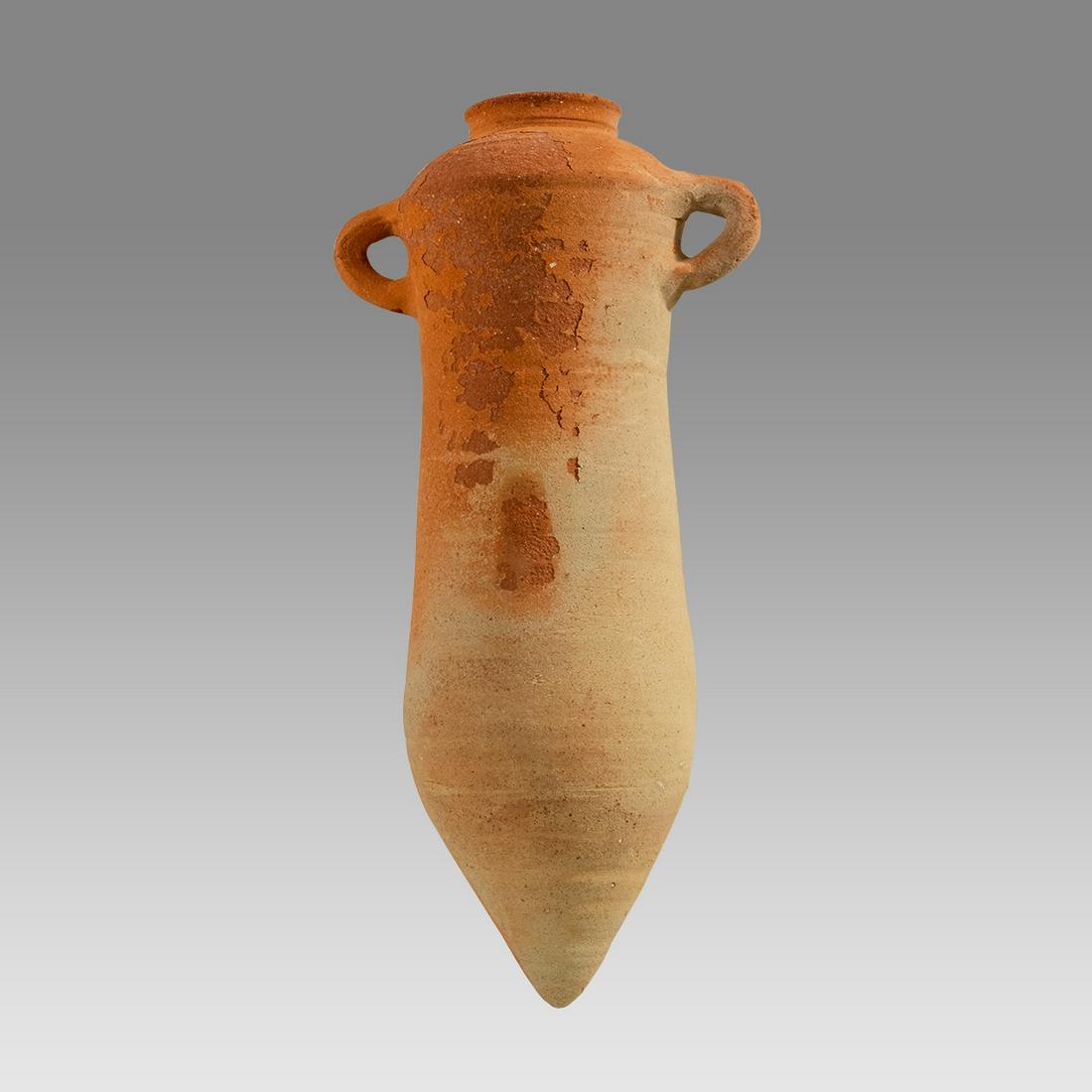 Ancient Holy Land Roman Terracotta Wine Amphora c.2nd century AD.: Ancient Holy Land Roman Terracotta Wine Amphora c.2nd century AD. Size 21 inches high, 9 1/2 inches across handles. Fine form ancient Roman Terracotta wine amphora with twin handles. Ex Private NYC Co