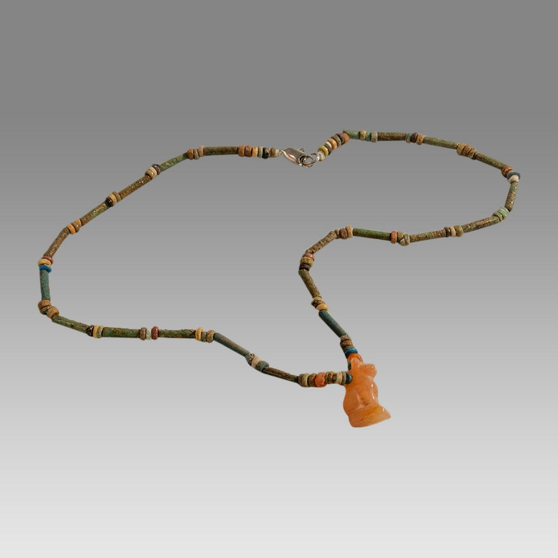 Ancient Egyptian Faience, Bead Necklace c.300-50 BC.: Ancient Egyptian Faience, Bead Necklace c.300-50 BC. Size 16 1/2 inches length. Great Looking single strand Faience Bead necklace. Egyptian stone Bastet cat amulet (age unknown). wearable. Provenance: