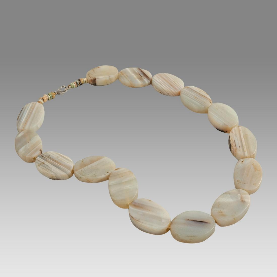 Mesopotamian Agate Stone Bead Necklace.: Mesopotamian Agate Stone Bead Necklace. Size 18 1/4 inches length. Great Looking single strand stone Agate Bead necklace age unknown. wearable. Provenance: Ex Secret Eyes Gallery New York 1970's-1980'