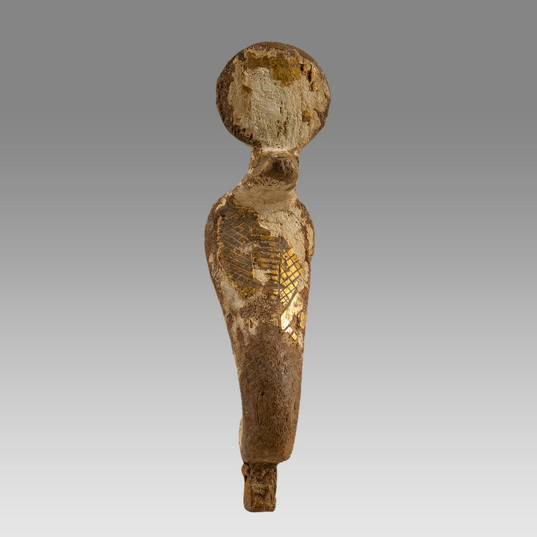 Ancient Egyptian Wood Uraeus c.600-30 BC.: Ancient Egyptian Wood Uraeus c.600-30 BC. Size 5 1/4 inches high. Carved wood Uraeus Cobra with traces of gold in front. suspension hole at back neck. Provenance: Ex Peter Alexander Ruthven collection