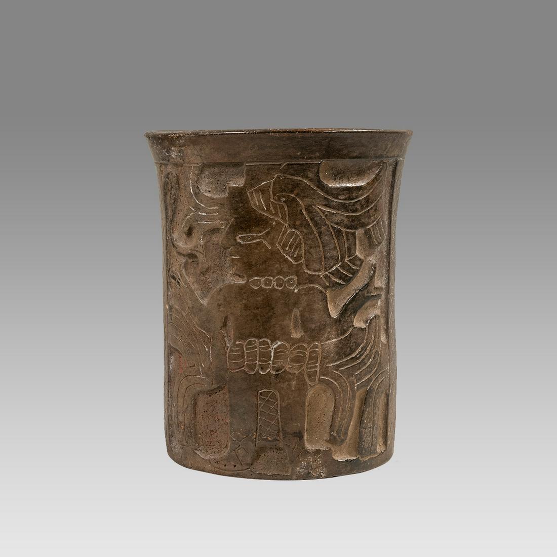 Pre Columbian Mayan Terracotta Cylindrical Vessel.: Pre Columbian Mayan Terracotta Cylindrical Vessel. Size 6 3/8 inches high. 5 1/8 inches diameter. Fne large Terracotta cylindrical vessel with image of the Maize god's birth. re carved after antiquity