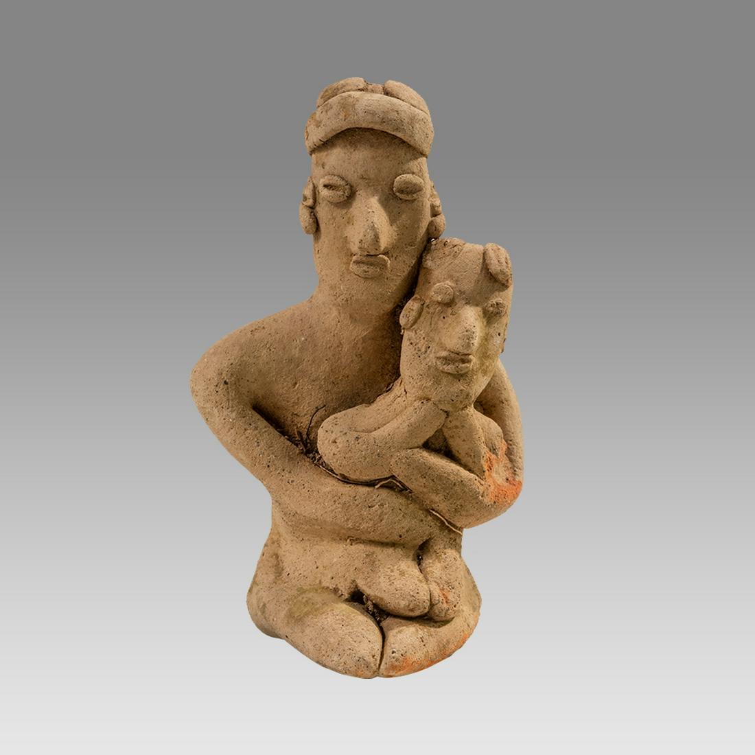 Colima Mother & Child Figure, Ca. 100 B.C. - 250 A.D.: Colima Mother & Child Figure, Ca. 100 B.C. - 250 A.D. Size 3 7/8 inches high. Fine terracotta seated mother and child. Colima, Mexico. Ex. Private Nevada collection, ex. Dr. David Harner collection, A