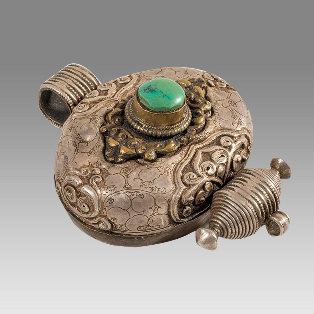 Antique Tibetan Silver and copper Marriage Pendant.: Antique Tibetan Silver and copper Marriage Pendant. Size 3 1/2 x 2 3/4 inches. Fine silver and copper pendant with stone in the center, suspension loop. Ex NYC collection.