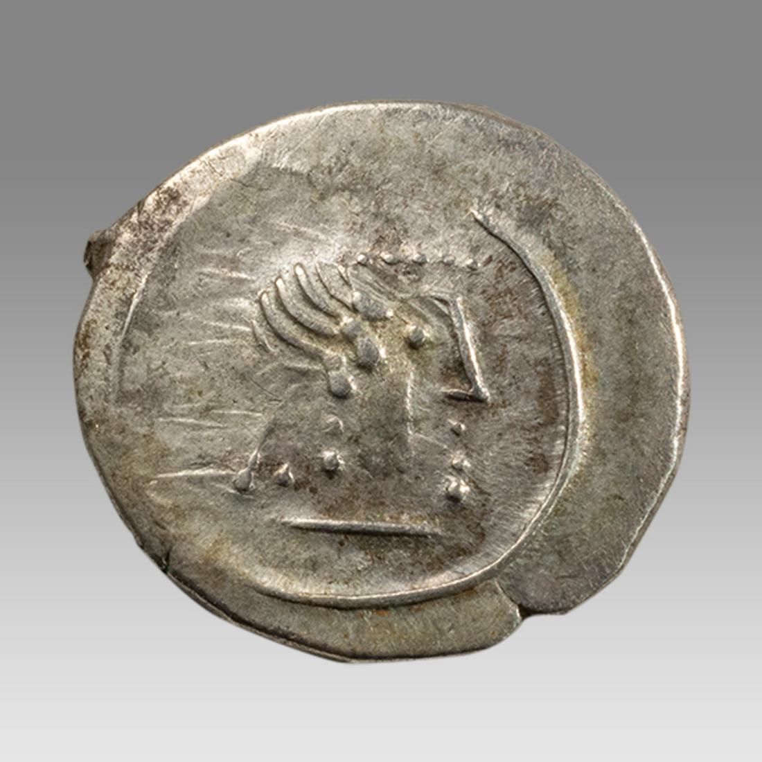 ARABIA, Southern. Himyar. Tha'rÄn Ya'Å«b Yuhan'im. Circa AD 175-215. Silver Unit: ARABIA, Southern. Himyar. Tha'rÄn Ya'Å«b Yuhan'im. Circa AD 175-215. Silver Unit (12mm). Male head right / Diademed head right, â€˜scepterâ€™ to right. VF.