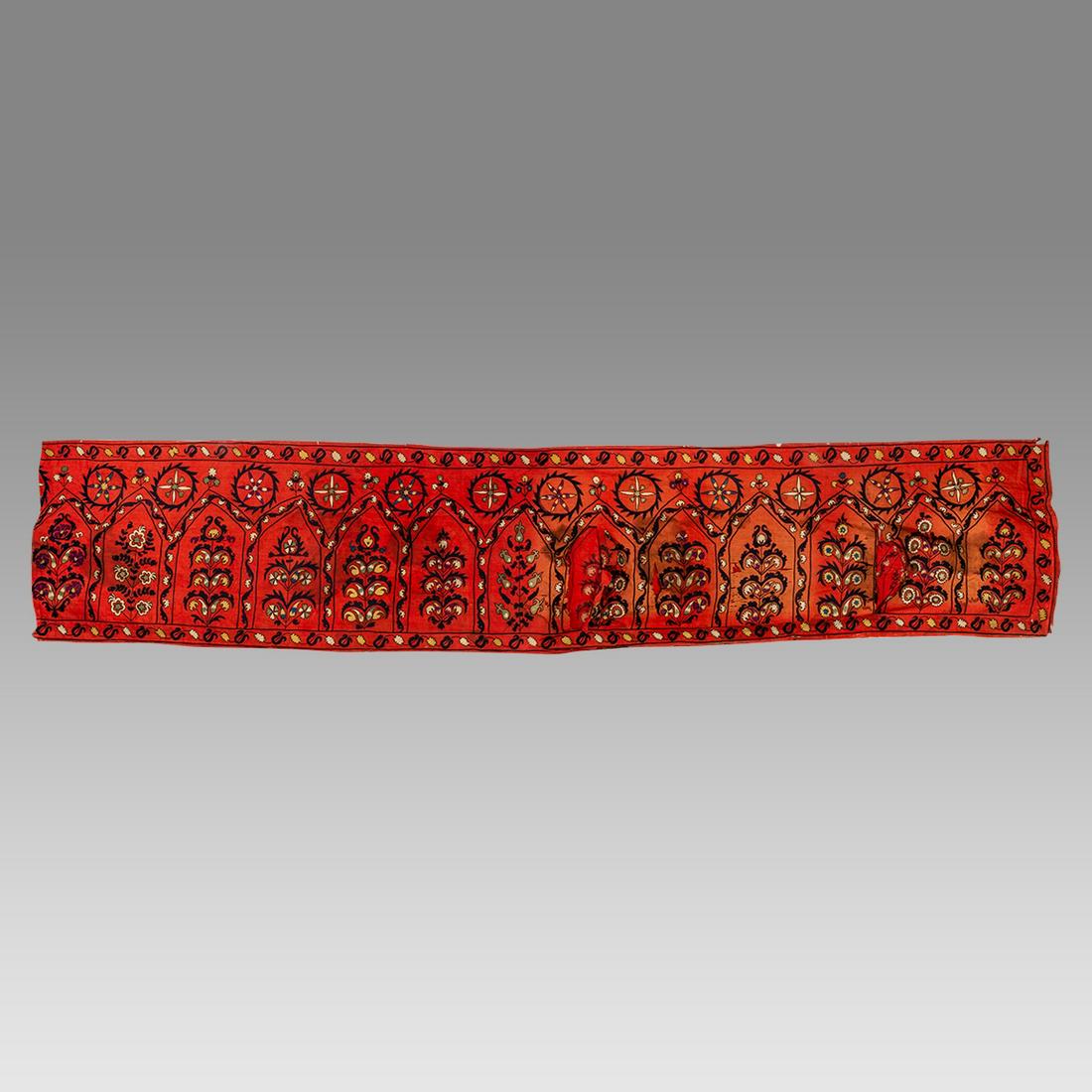 Rare 19th century Mihrab Prayer Uzbek Suzani Embroidered red textile.: Rare 19th century Mihrab Prayer Uzbek Suzani Embroidered red textile.. Size 184 x 38 1/4 inches wide. A large embroidered textile with floral design.
