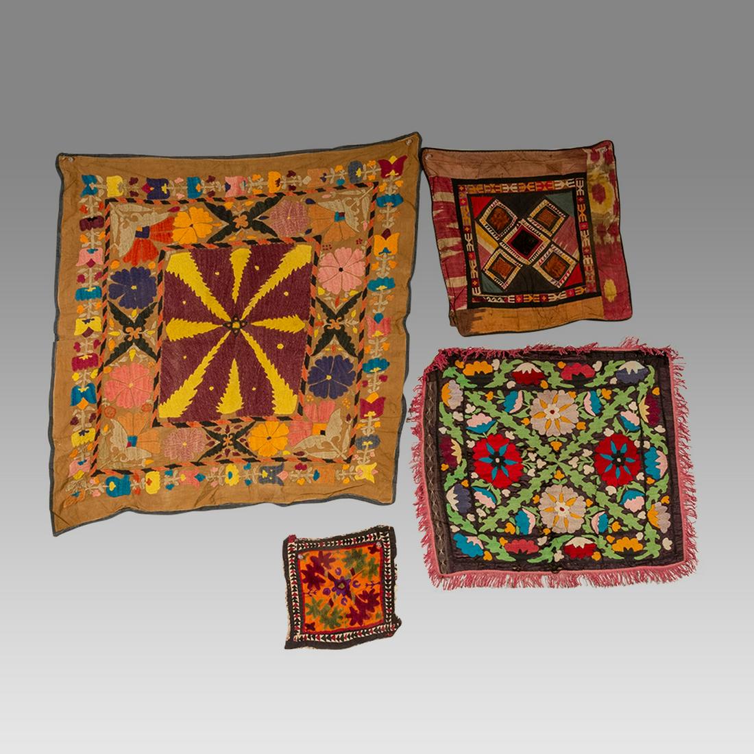 Antique Bukhara suzani embroidered textile (4).: Antique Bukhara suzani embroidered textile (4). Size 10 - 31 inches length. Fine embroidered Silk Textile decorated with ornate design. Ex Los Angeles CA Collection