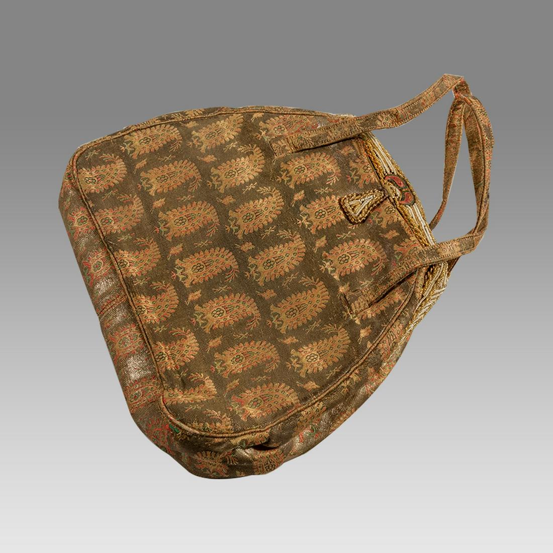 Ladies Purse, Made with 18th cent Indian Silk Textile.: Ladies Purse, Made with 18th cent Indian Silk Textile. Size 9 x 7 1/2 inches. Antique Indian silk textile fragment decorated with floral design made into Fancy Ladies Purse. Ex Los Angeles CA Collecti