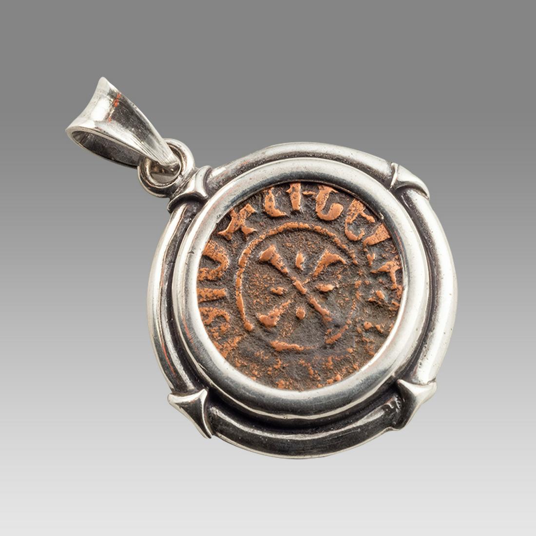 Ancient Armenia Bronze Coin Set in Silver Pendant.: Ancient Armenia Bronze Coin Set in Silver Pendant. Size 1 3/4 inches with the suspension loop. Ancient Armenia bronze coin Levon III 1303-1307 AD. Set in Modern Silver pendant. The coin is ancient, th