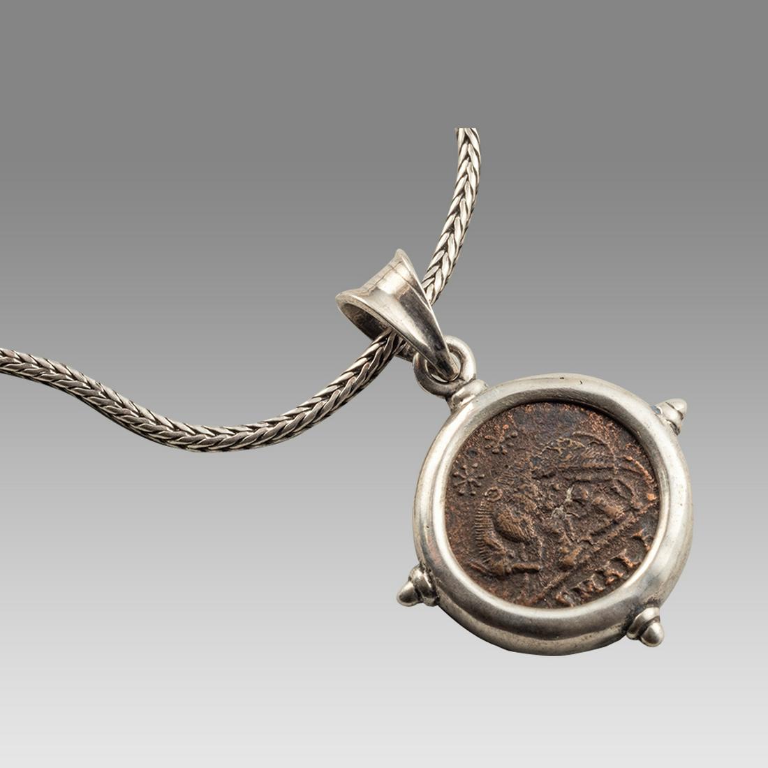 Ancient Roman, Constantine I Bronze coin set in Silver Necklace 307-337 CE.: Ancient Roman, Constantine I Bronze coin set in Silver Necklace 307-337 CE. Authentic Roman Empire bronze coin, emperor facing, Reverse with Wolf and twins. set in silver necklace. Fine condition. The