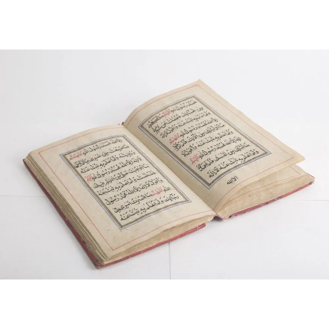 Antique Islamic Persian Quran Prayer Book.: Antique Islamic Persian Quran Prayer Book. Size 6 7/8 x 4 1/4 inches. Very fine Hand written Quran/Prayer book in Arabic and Persian calligraphy with original hard cover. Condition: Minor ware to the