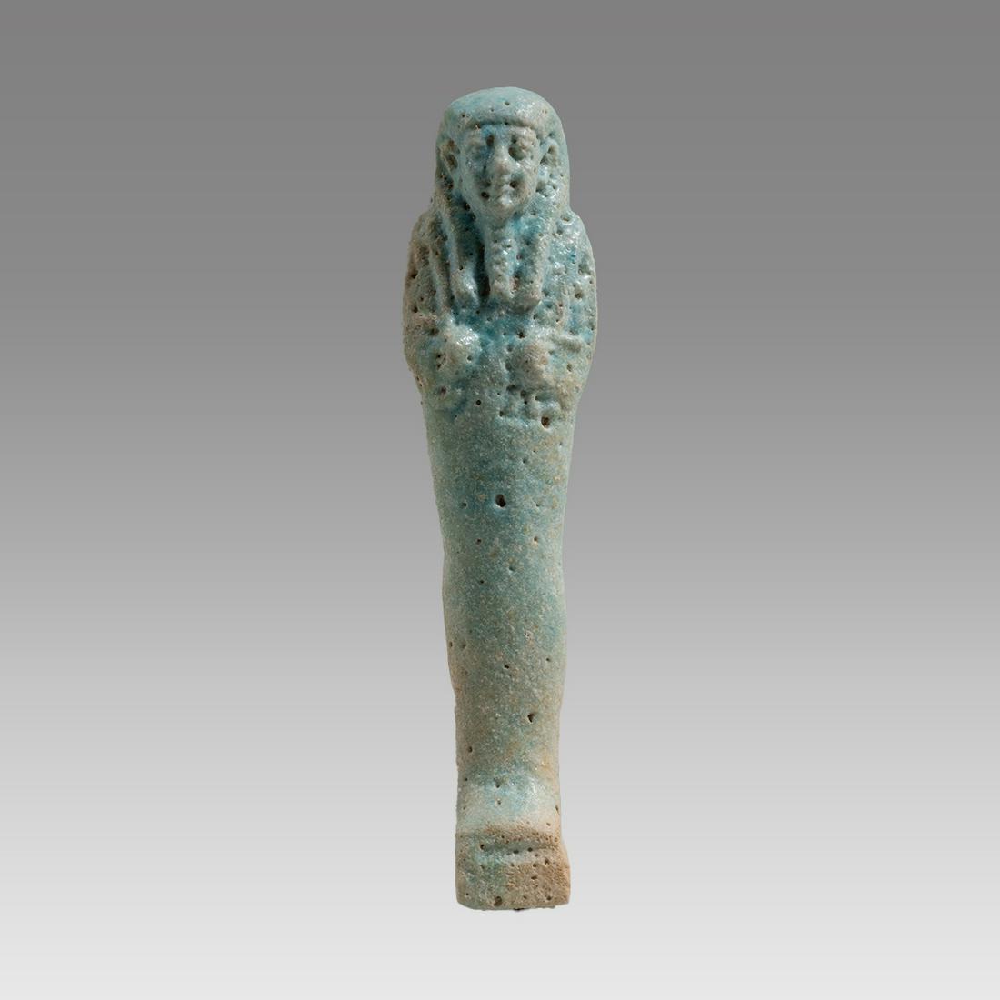 Ancient Egyptian Faience Ushabti Figure c.600-30 BCE.: Ancient Egyptian Faience Ushabti Figure c.600-30 BCE. Size 4 1/8 inches high. Fine blue/white faience Ushabti figure. Great quality and details. Provenance: Ex Secret Eyes Gallery New York 1970's-1980