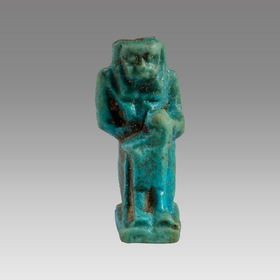 Ancient Egyptian Blue Faience Amulet of Isis c.600 BC.: Ancient Egyptian Blue Faience Amulet of Isis c.600 BC. Size 1 1/2 inches high. Fine amulet of Seated Isis holding the child Horus. Provenance: Ex Secret Eyes Gallery New York 1970's-1980's.