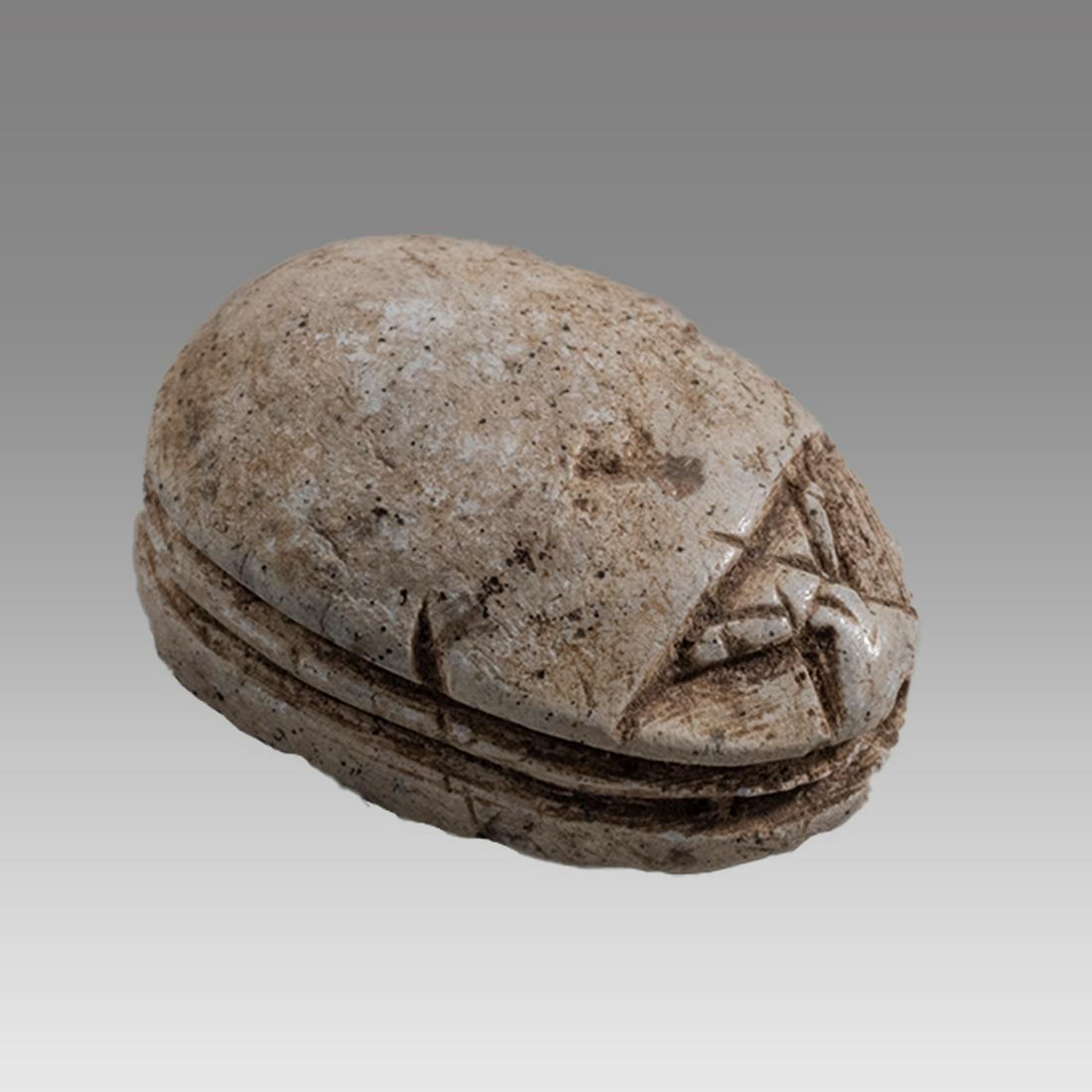 Ancient Egyptian Steatite stone Scarab c.1500-1100 BCE.: Ancient Egyptian Steatite stone Scarab c.1500-1100 BCE. Size 19 x 14 mm. Glazed steatite scarab New Kingdom with stealized beatle back. Provenance: Ex Secret Eyes Gallery New York 1970's-1980's.