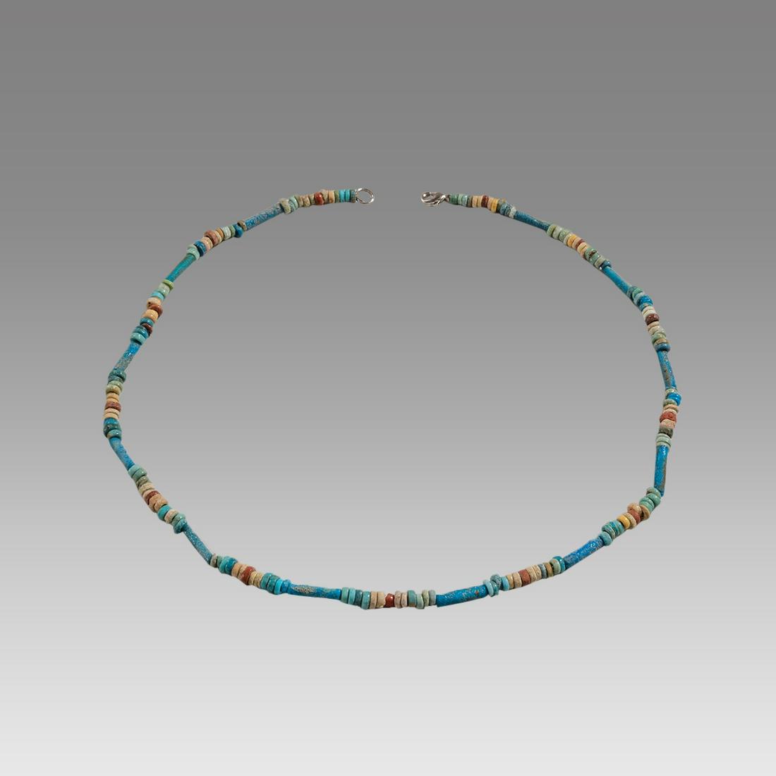 Ancient Egyptian Faience Bead Necklace c.300-50 BC.: Ancient Egyptian Faience Bead Necklace c.300-50 BC. Size 18 1/4 inches length. Great Looking single strand Faience Bead necklace. wearable. Provenance: Ex Secret Eyes Gallery New York 1970's-1980's
