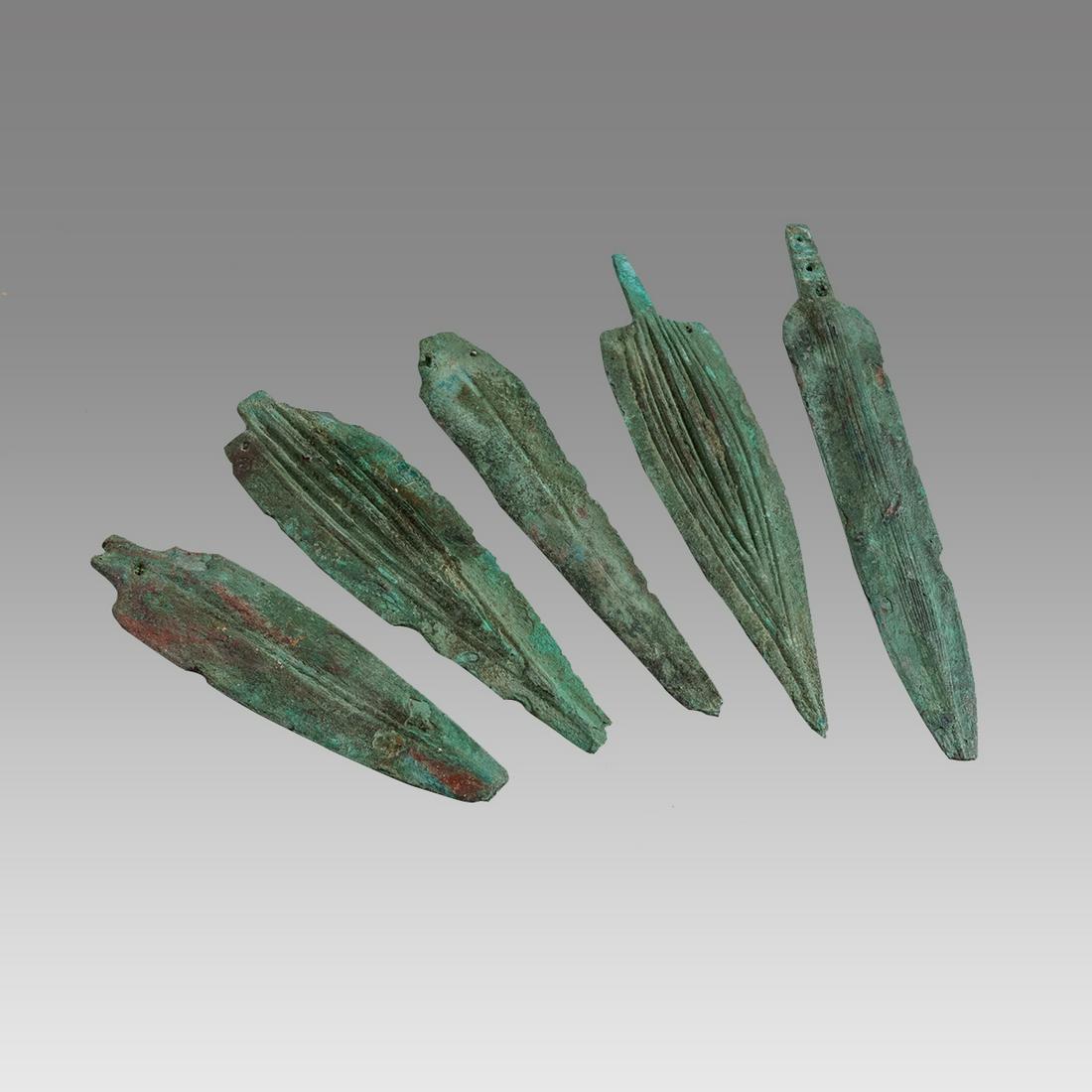 Lot of 5 Ancient Holyland Canaanite Bronze Spears c.1200 BC.: Lot of 5 Ancient Holyland Canaanite Bronze Spears c.1200 BC. Size 6 1/4 - 10 7/8 inches length. Great collection of 5 bronze spears from Ancient Israel Canaanite. Provenance: Private NYC collection ac