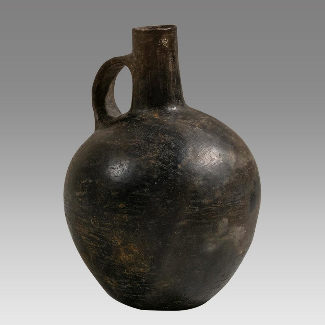 Chimu Blackware Vessel with Ribbon Formed Handle Pre-Columbian, Chimu/Inca culture, ca. 1100 to 1532 (1 of 3)