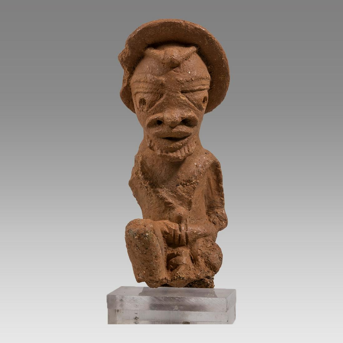 Nok figure-Terracotta of a man. NOK, NIGERIA, II CENTURY BC - II CENTURY CE. (1 of 5)