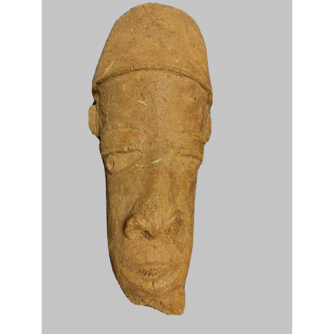 Nok figure-Terracotta Head of a Man. NOK, NIGERIA, II CENTURY BC - II CENTURY CE.: Nok figure-Terracotta Head of a Man. NOK, NIGERIA, II CENTURY BC - II CENTURY CE. Size 11 1/2 inches high. Large Terracotta head of a man wearing headdress with lagre eyes and big nose. Ex Private New