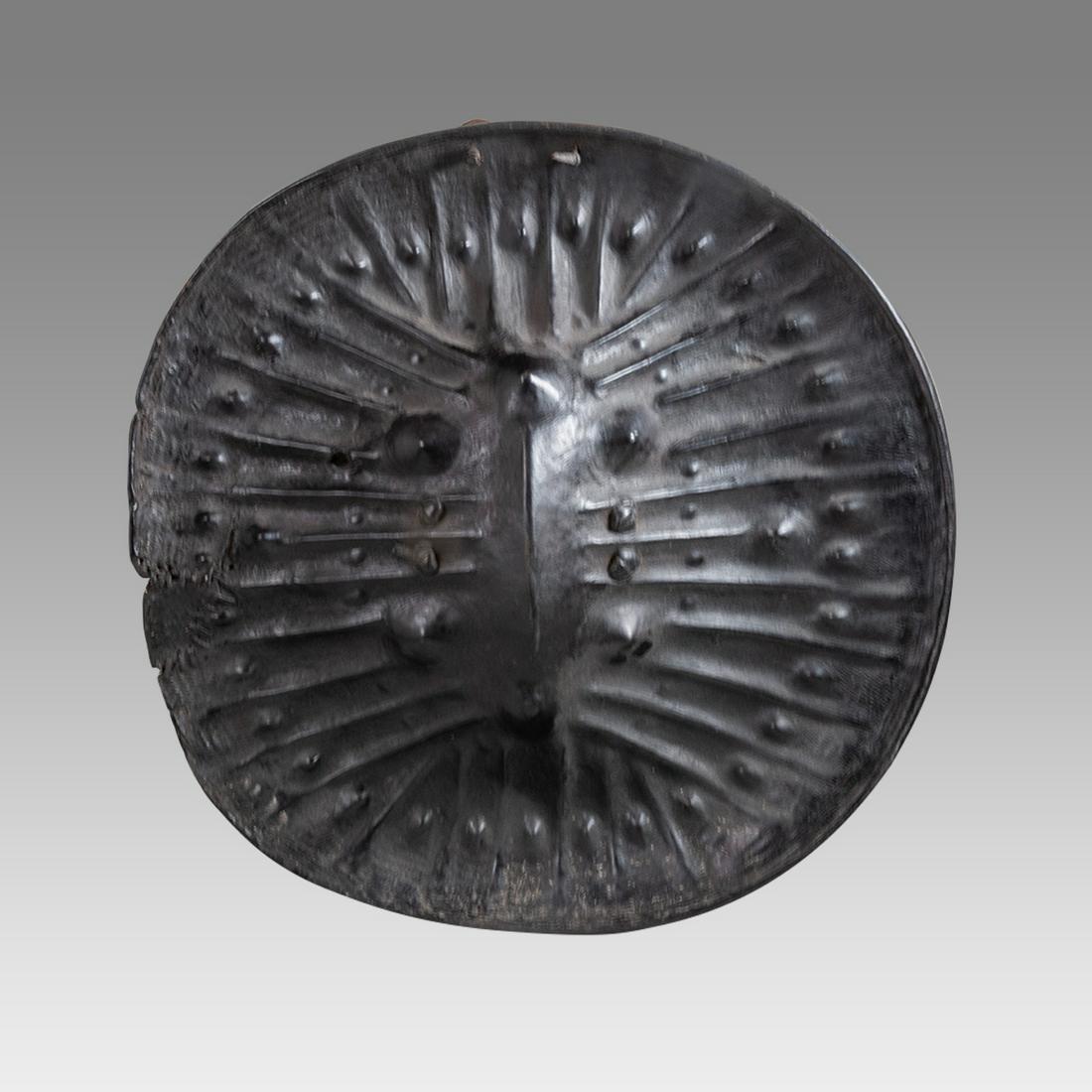 Antique Ethiopian Large Oromo buffalo hide shield with bullet hole. (1 of 2)