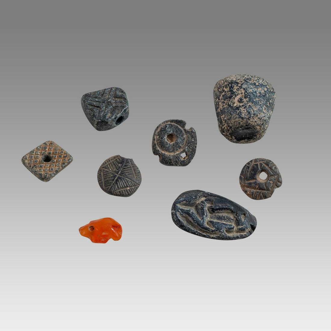 Lot of 8 Near eastern Style Stone Cylinder Seals and Amulets. (1 of 2)