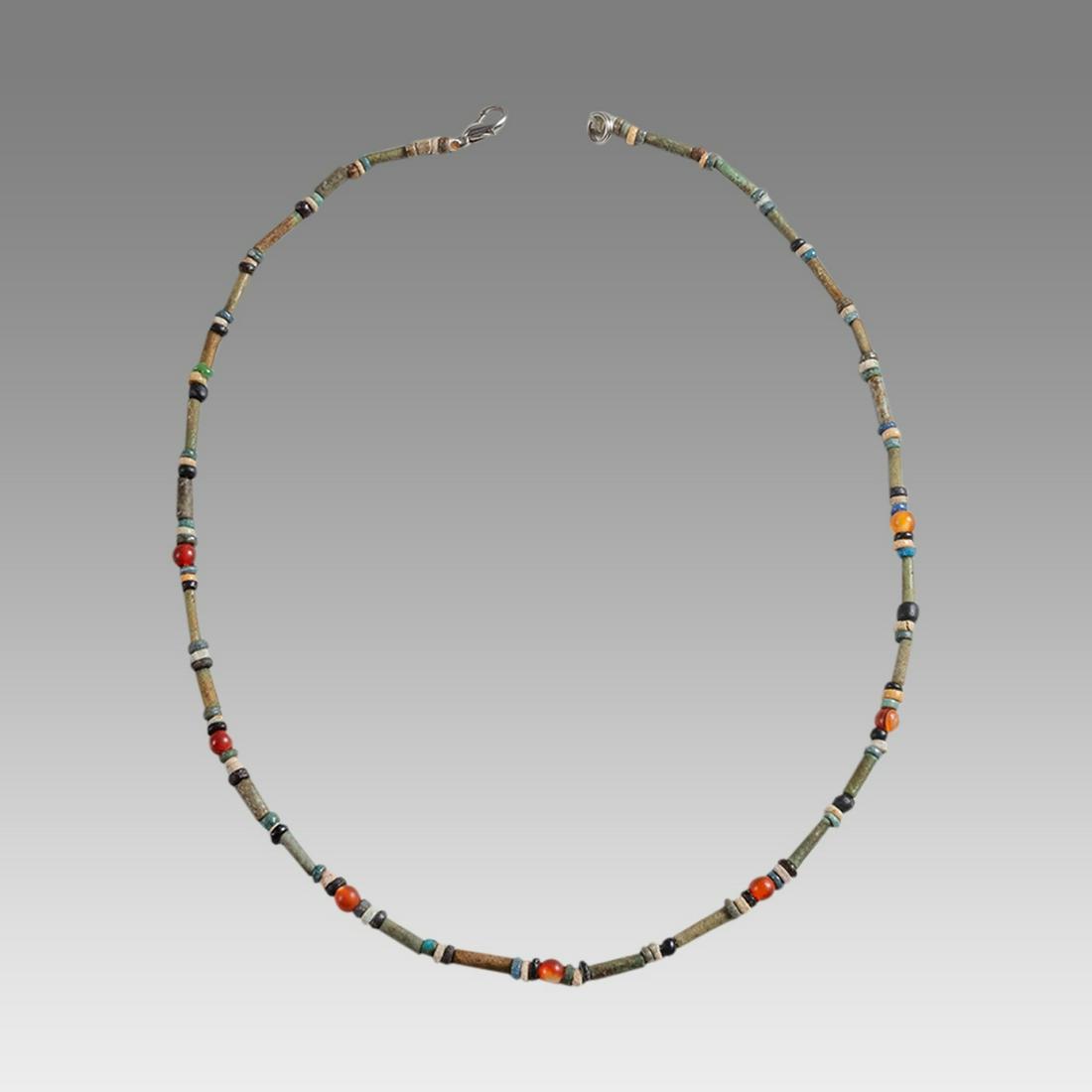 Ancient Egyptian Faience Bead Necklace c.300-50 BC.: Ancient Egyptian Faience Bead Necklace c.300-50 BC. Size 17 1/2 inches length. Great Looking single strand Faience Bead necklace. wearable. Provenance: Ex Secret Eyes Gallery New York 1970's-1980's.