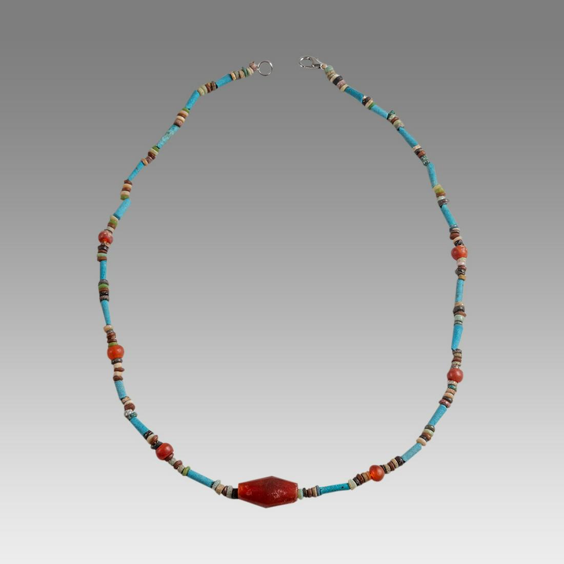 Ancient Egyptian Faience Bead Necklace c.300-50 BC.: Ancient Egyptian Faience Bead Necklace c.300-50 BC. Size 18 inches length. Great Looking single strand Faience Bead necklace mixed with red Agate beads. wearable. Provenance: Ex Secret Eyes Gallery Ne