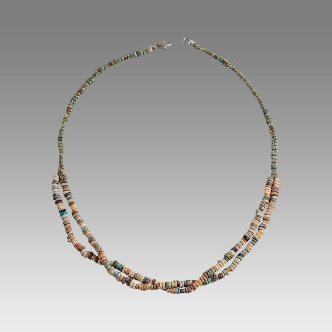 Ancient Egyptian Faience Bead Necklace c.300-50 BC.: Ancient Egyptian Faience Bead Necklace c.300-50 BC. Size 18 3/4 inches length. Great Looking double strands Faience Bead necklace. wearable. Provenance: Ex Secret Eyes Gallery New York 1970's-1980's.