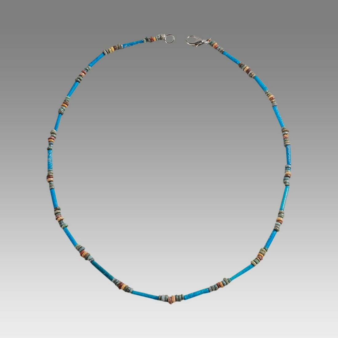 Ancient Egyptian Faience Bead Necklace c.300-50 BC.: Ancient Egyptian Faience Bead Necklace c.300-50 BC. Size 18 1/4 inches length. Great Looking single strand Faience Bead necklace. wearable. Provenance: Ex Secret Eyes Gallery New York 1970's-1980's.