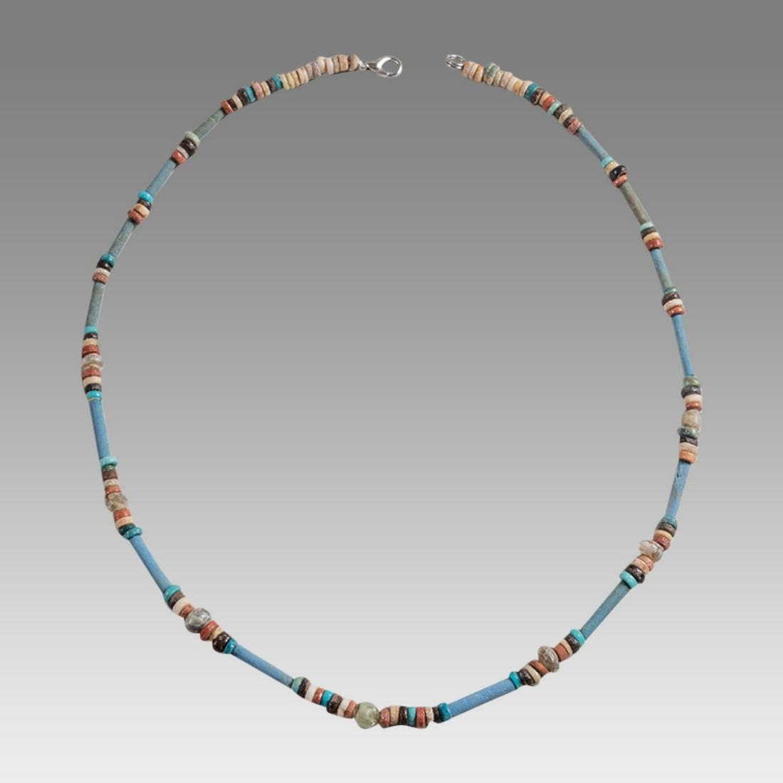 Ancient Egyptian Faience Bead Necklace c.300-50 BC.: Ancient Egyptian Faience Bead Necklace c.300-50 BC. Size 19 1/2 inches length. Great Looking single strand Faience Bead necklace. mixed with glass beads. wearable. Provenance: Ex Secret Eyes Gallery N