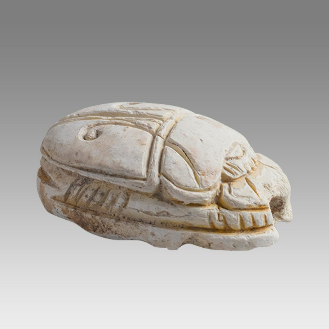 Ancient Egyptian Steatite stone Scarab c.1500-1100 BCE.: Ancient Egyptian Steatite stone Scarab c.1500-1100 BCE. Size 18 x 12 mm. Glazed steatite scarab New Kingdom with stealized beatle back. Provenance: Ex Secret Eyes Gallery New York 1970's-1980's.