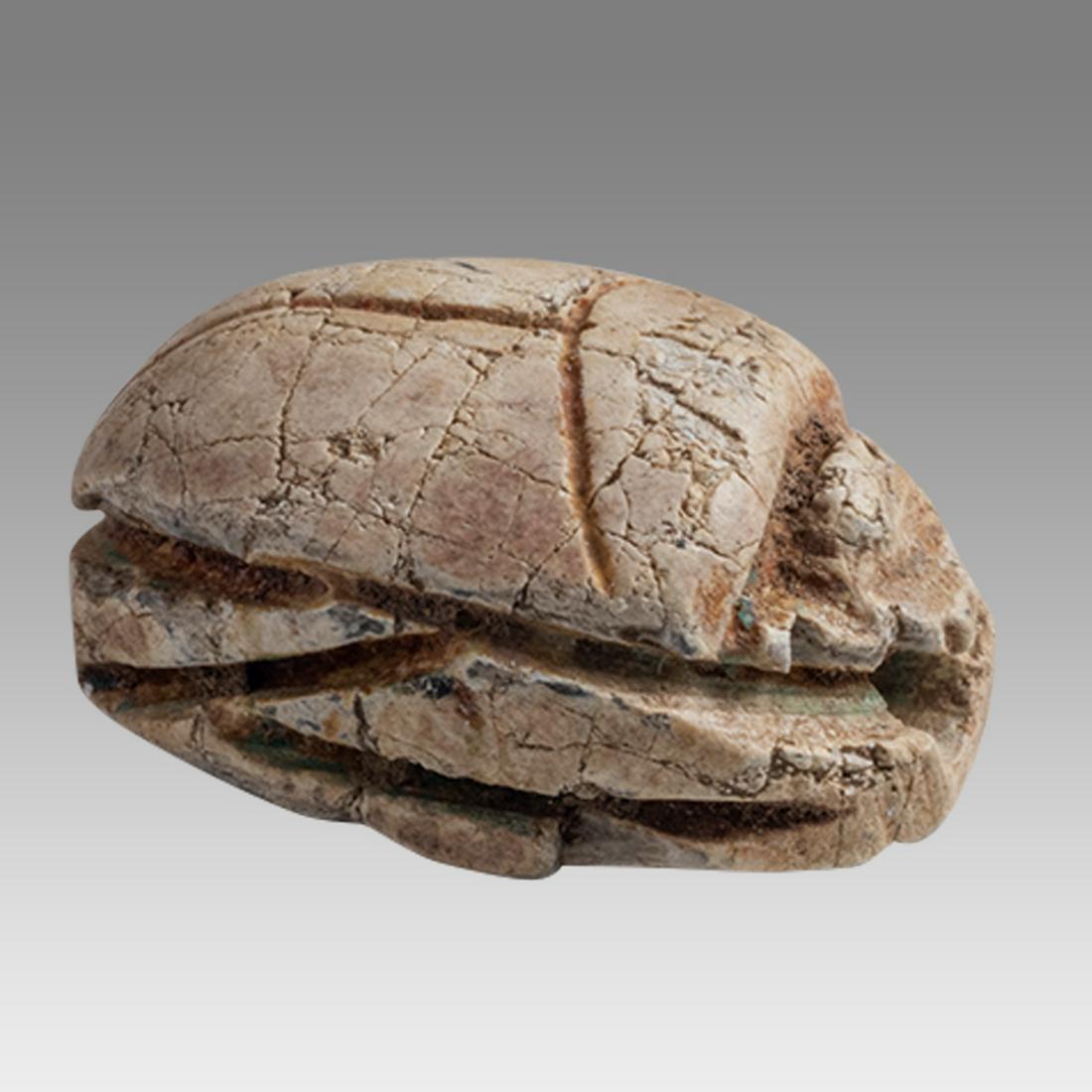 Ancient Egyptian Steatite stone Scarab c.1500-1100 BCE.: Ancient Egyptian Steatite stone Scarab c.1500-1100 BCE. Size 16 x 12 mm. Glazed steatite scarab New Kingdom with stealized beatle back. Provenance: Ex Secret Eyes Gallery New York 1970's-1980's.