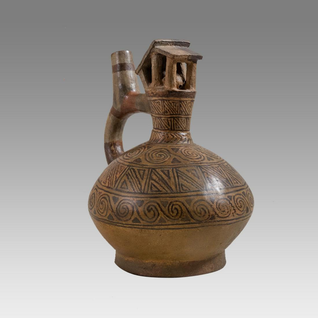 Ancient Pre-columbian Unique Moche IV Stirrup Spout Vessel c.400-750 AD.: Ancient Pre-columbian Unique Moche IV Stirrup Spout Vessel c.400-750 AD. Size 8 inches high. Pre-Columbian, North Coast Peru, Moche, ca 400 to 750 AD. Moche IV Stirrup Spout Vessel. Fine pottery Stirr