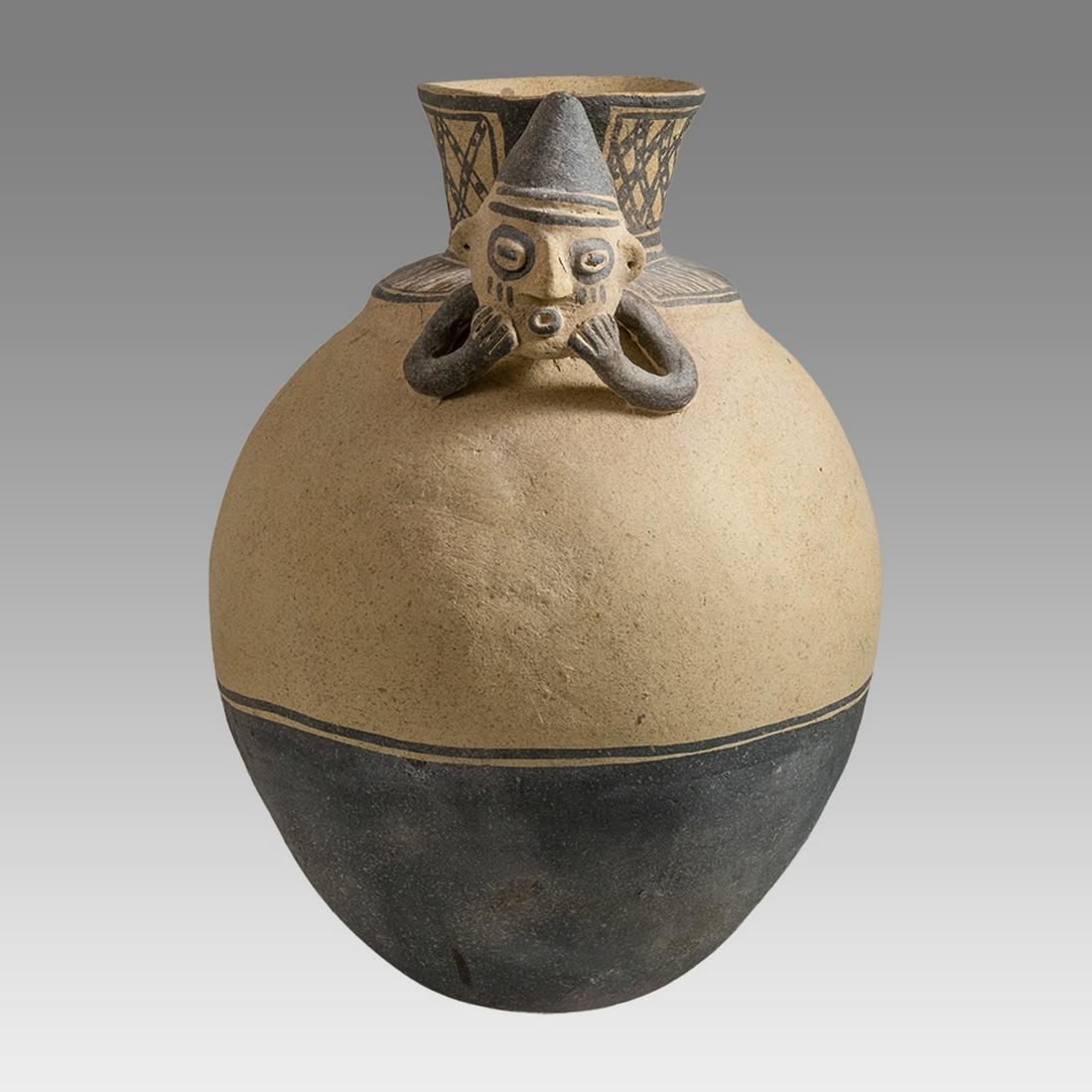 Chancay Style Potter Jar with figure. (1 of 3)