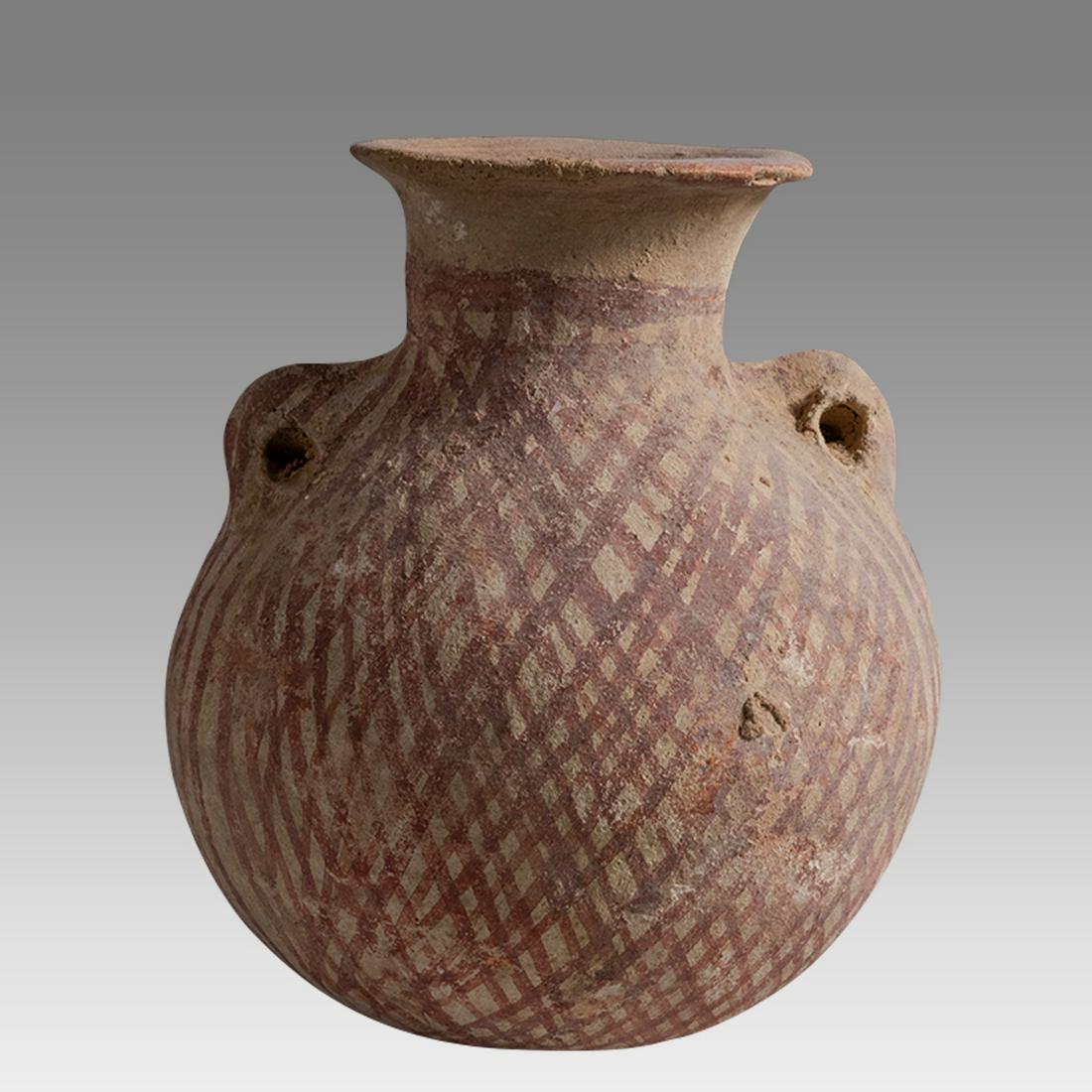 Ancient Holy Land Bronze Age Terracotta Vessel c.2000 BC.: Ancient Holy Land Bronze Age Terracotta Vessel c.2000 BC. Size 5 inches high, 4 inches diameter. Fine Ancient Holy land Bronze age Terracotta Vessel with twin pierced handles decorated with geometric 