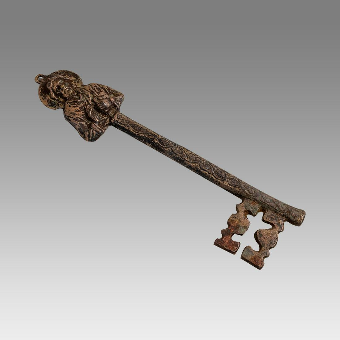 18th century Armenian Bronze key from church.: 18th century Armenian Bronze key from church. Size 8 7/8inches length. A cast bronze large key with Christ, Armenian writing at back.