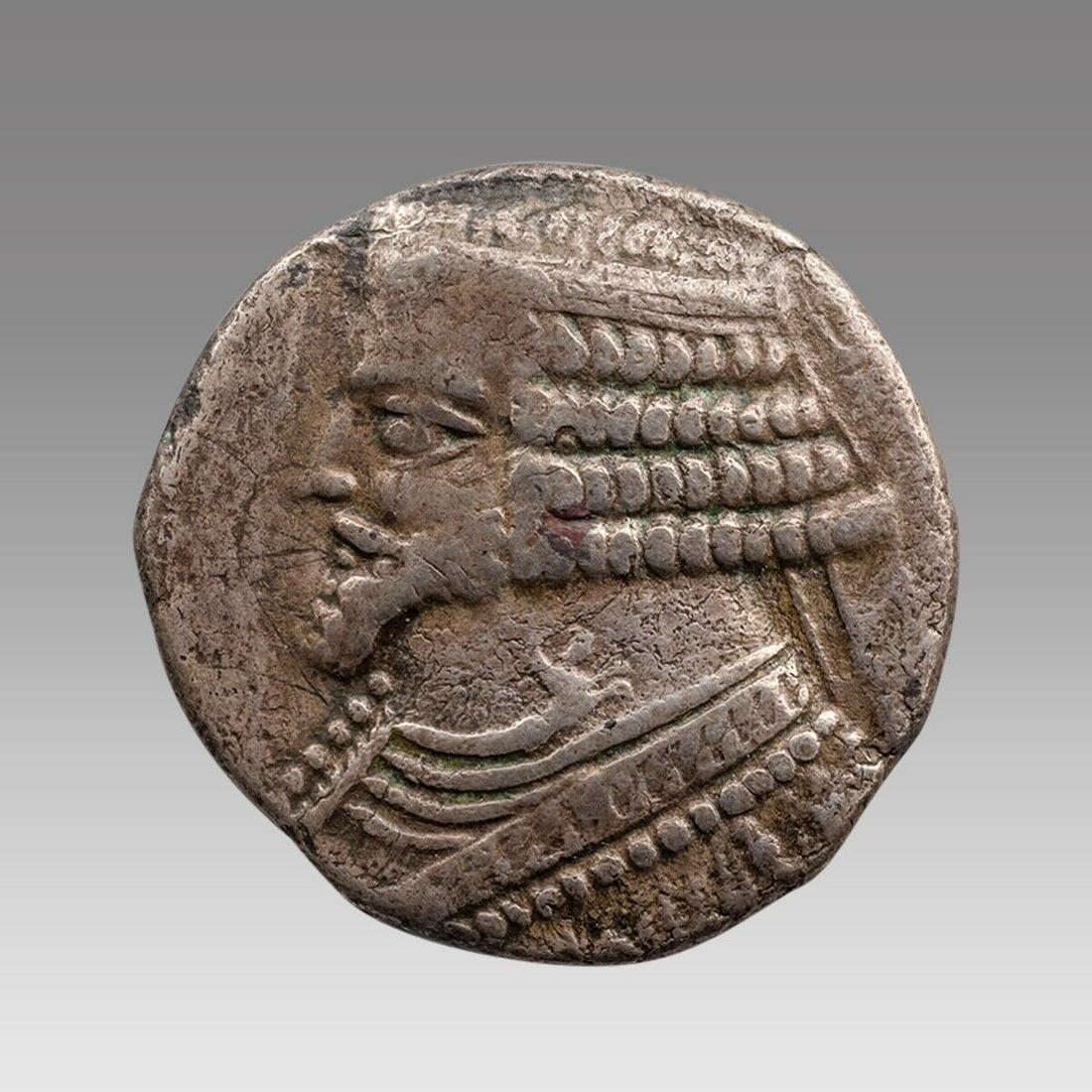 KINGS of PARTHIA. Phraates IV. Circa 38-2 BC. AR Tetradrachm: KINGS of PARTHIA. Phraates IV. Circa 38-2 BC. AR Tetradrachm (28mm, 9.79 g, 12h). Seleukeia on the Tigris mint. Uncertain date. Diademed bust left, wart on forehead / Phraates seated right, receiving 